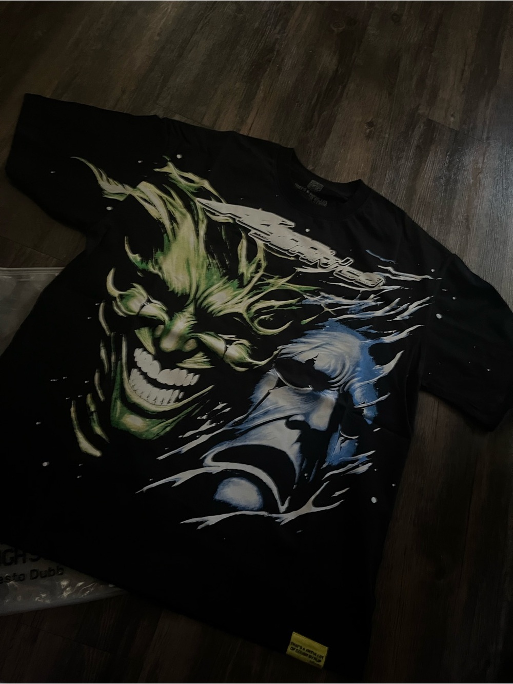 Men's Black Graphic Tee with Green and Blue Comic Faces by